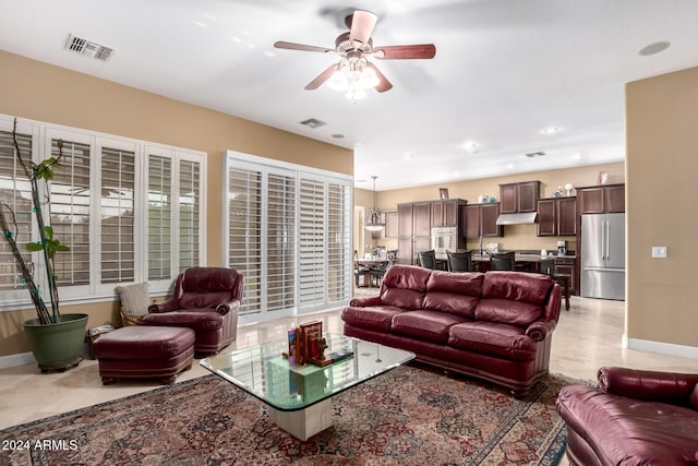 living room featuring ceiling fan