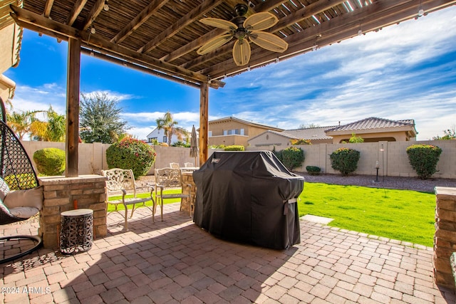 view of patio featuring ceiling fan and area for grilling