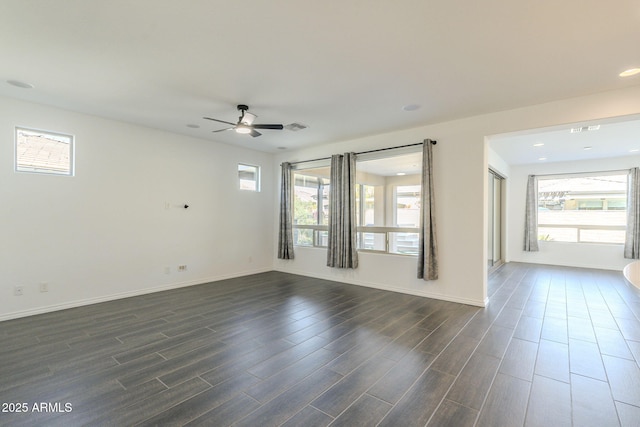 unfurnished room with plenty of natural light and ceiling fan