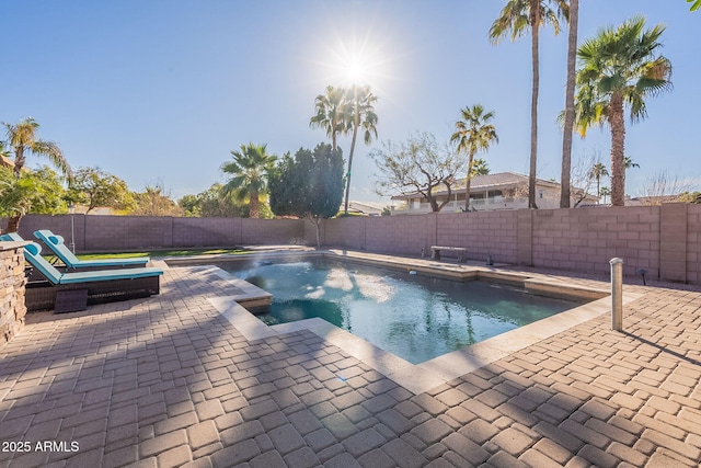 12925 W Llano Dr, Litchfield Park, AZ 85340 - view of swimming pool with a fenced in pool, a fenced backyard, and a patio