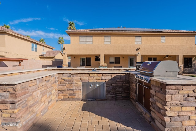 12925 W Llano Dr, Litchfield Park, AZ 85340 - view of patio featuring a grill, a sink, and area for grilling