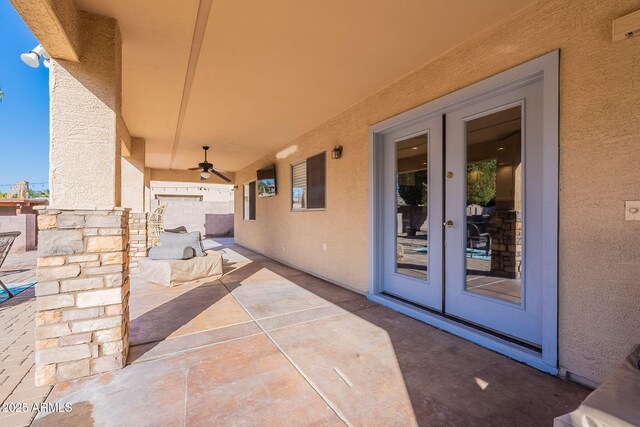 12925 W Llano Dr, Litchfield Park, AZ 85340 - view of patio featuring ceiling fan and french doors