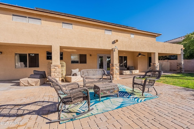 12925 W Llano Dr, Litchfield Park, AZ 85340 - view of patio / terrace with ceiling fan, fence, and an outdoor living space