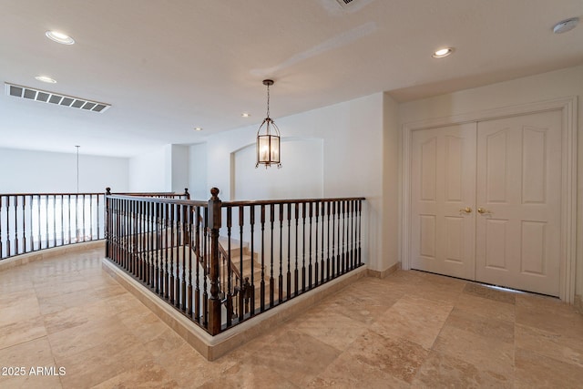12925 W Llano Dr, Litchfield Park, AZ 85340 - hall featuring a chandelier, recessed lighting, visible vents, and baseboards