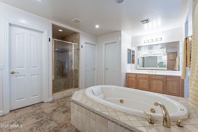 12925 W Llano Dr, Litchfield Park, AZ 85340 - bathroom featuring a closet, visible vents, a shower stall, vanity, and a whirlpool tub