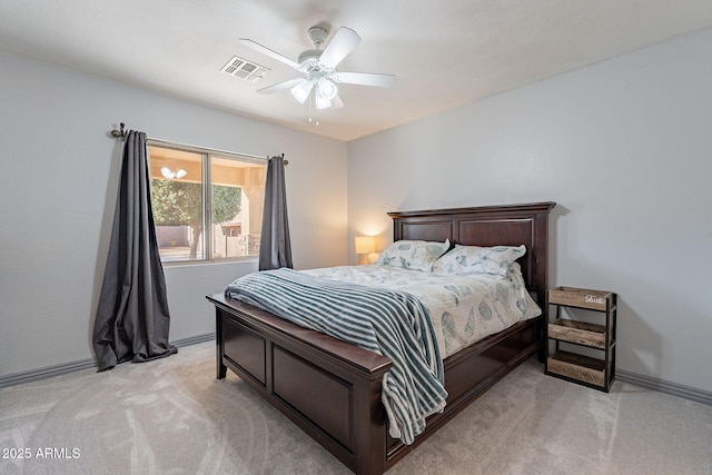 12925 W Llano Dr, Litchfield Park, AZ 85340 - bedroom with a ceiling fan, light colored carpet, visible vents, and baseboards