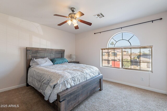 12925 W Llano Dr, Litchfield Park, AZ 85340 - carpeted bedroom featuring visible vents, ceiling fan, and baseboards