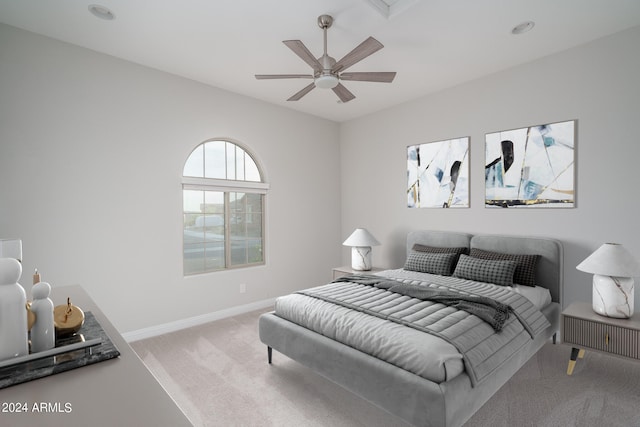 bedroom featuring ceiling fan and carpet flooring