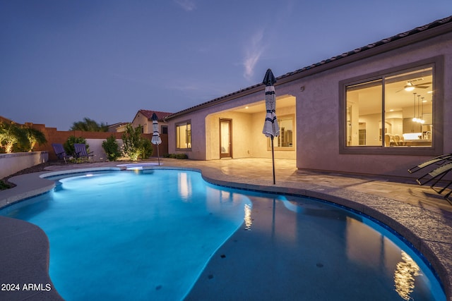 view of pool featuring a patio