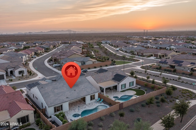 view of aerial view at dusk