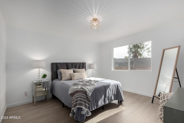 bedroom featuring hardwood / wood-style flooring