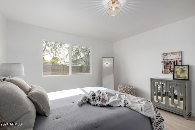 bedroom with light wood-type flooring