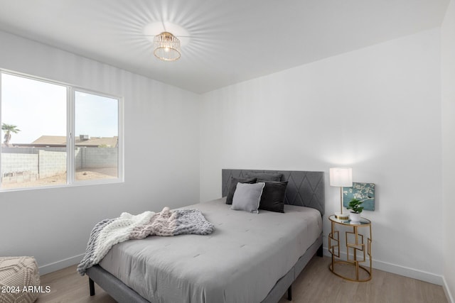 bedroom featuring light wood-type flooring