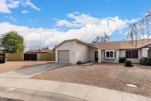 single story home with a garage