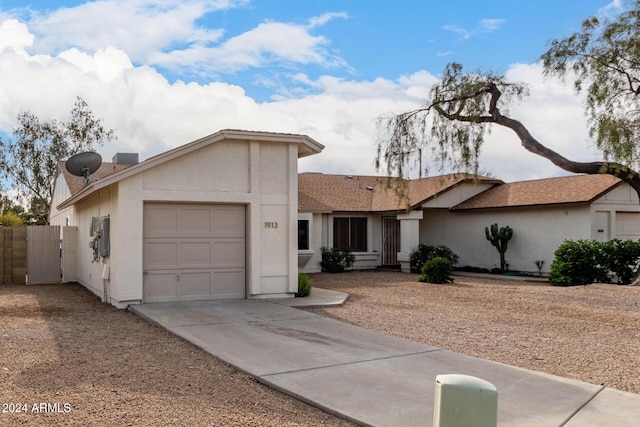 single story home with a garage