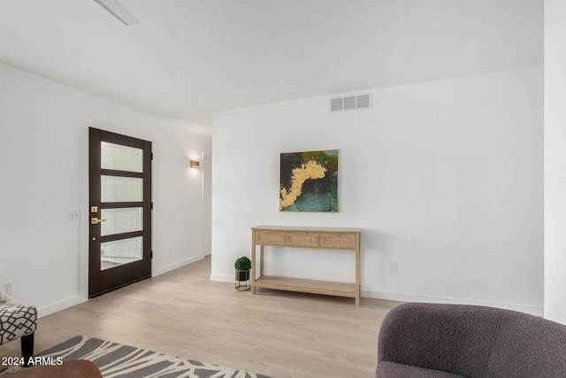 living area featuring light hardwood / wood-style flooring