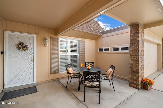 view of patio / terrace with a garage