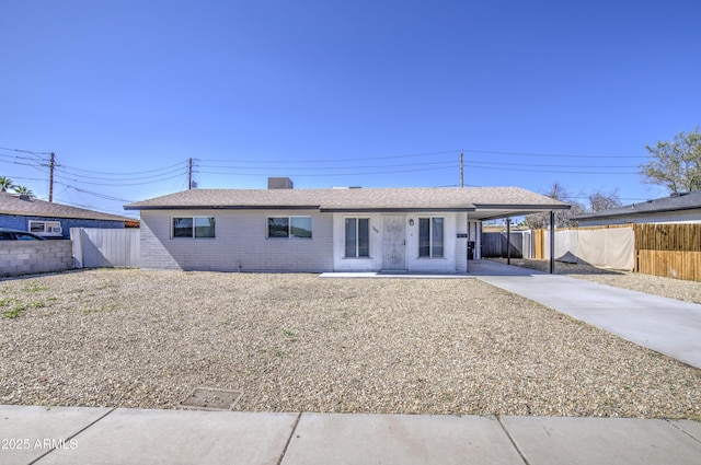 3408 W Virginia Ave, Phoenix, AZ 85009 - ranch-style house featuring concrete driveway and an attached carport
