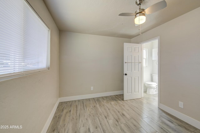 3408 W Virginia Ave, Phoenix, AZ 85009 - empty room with wood finished floors, baseboards, and a ceiling fan