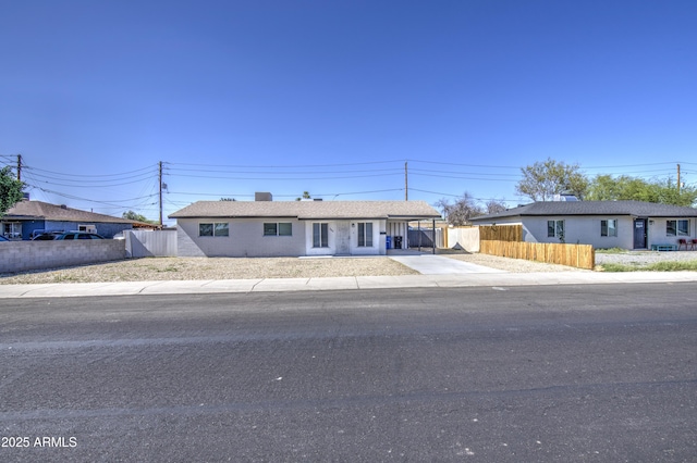 3408 W Virginia Ave, Phoenix, AZ 85009 - single story home featuring concrete driveway and an attached carport