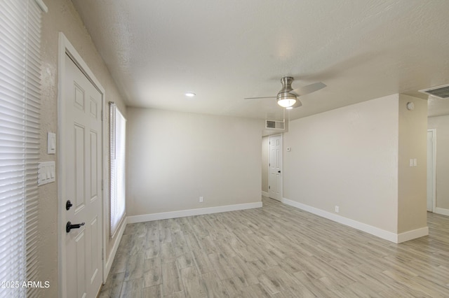 3408 W Virginia Ave, Phoenix, AZ 85009 - unfurnished room featuring light wood-type flooring, a ceiling fan, baseboards, and recessed lighting