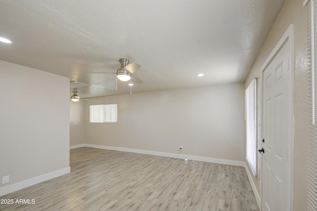 3408 W Virginia Ave, Phoenix, AZ 85009 - unfurnished room featuring light wood-style flooring, a ceiling fan, baseboards, and recessed lighting