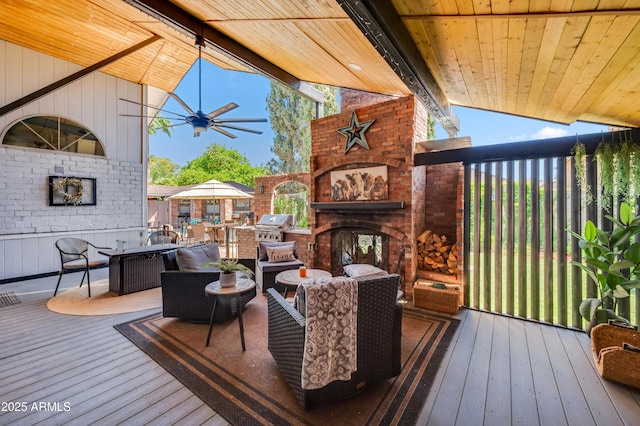 13207 N 55th Ave, Glendale, AZ 85304 - wooden terrace featuring a grill, outdoor dining area, and an outdoor living space with a fireplace