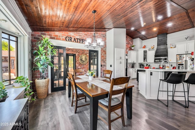 13207 N 55th Ave, Glendale, AZ 85304 - dining area with french doors, wood ceiling, lofted ceiling, a chandelier, and brick wall