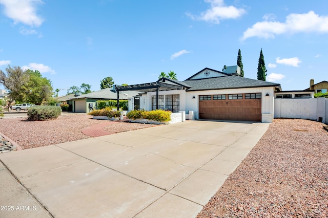 13207 N 55th Ave, Glendale, AZ 85304 - single story home featuring a garage, concrete driveway, and a pergola