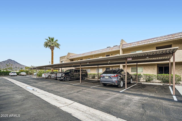 covered parking lot with a mountain view