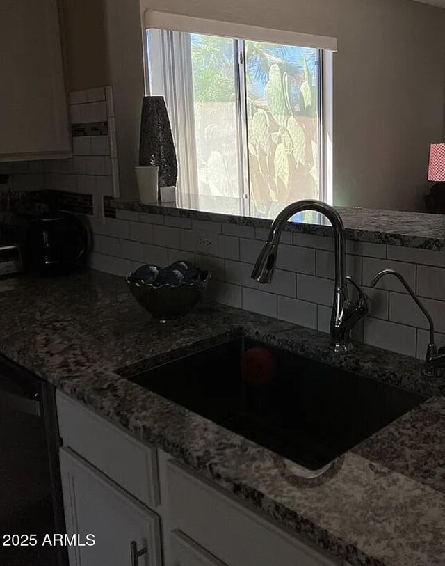 30178 N Coral Bean Dr, San Tan Valley, AZ 85143 - kitchen with a sink, backsplash, white cabinetry, dishwasher, and light stone counters