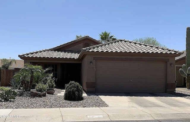 30178 N Coral Bean Dr, San Tan Valley, AZ 85143 - view of front of property featuring an attached garage, stucco siding, driveway, and a tiled roof