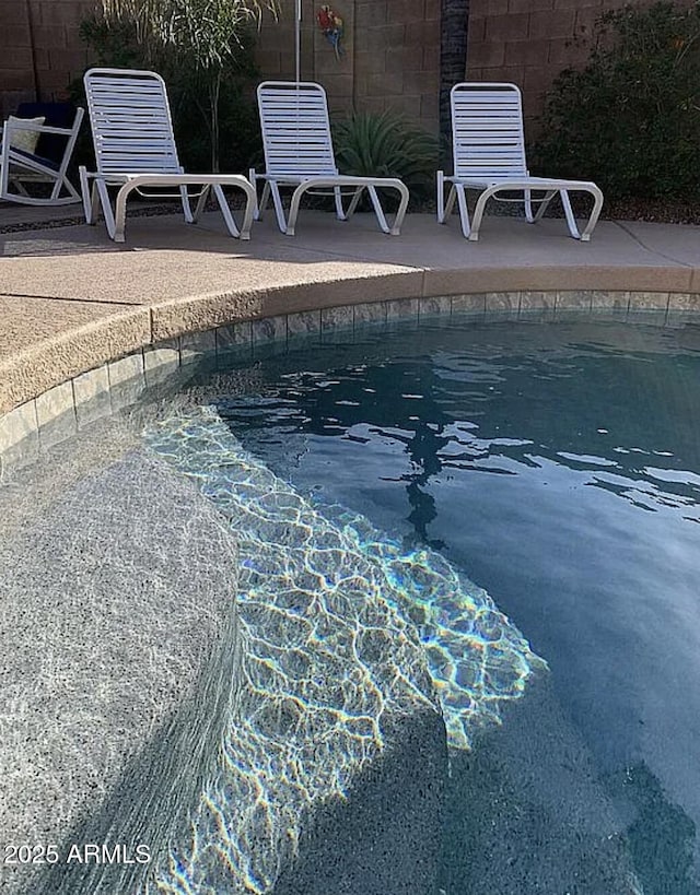 30178 N Coral Bean Dr, San Tan Valley, AZ 85143 - community pool with a patio area