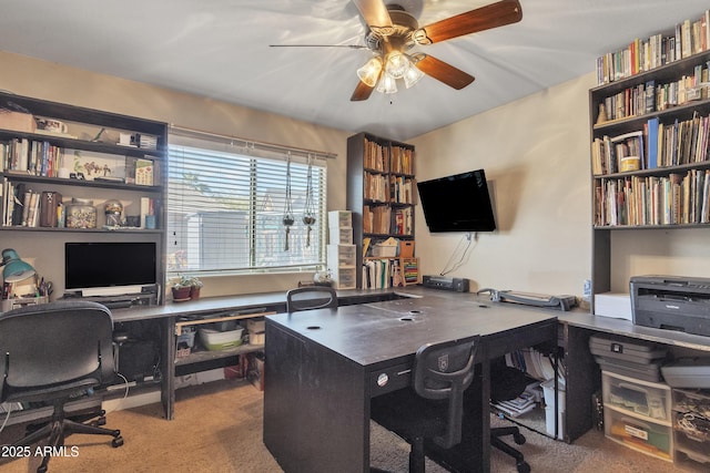 office area with a ceiling fan