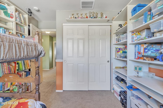 interior space featuring a closet and visible vents