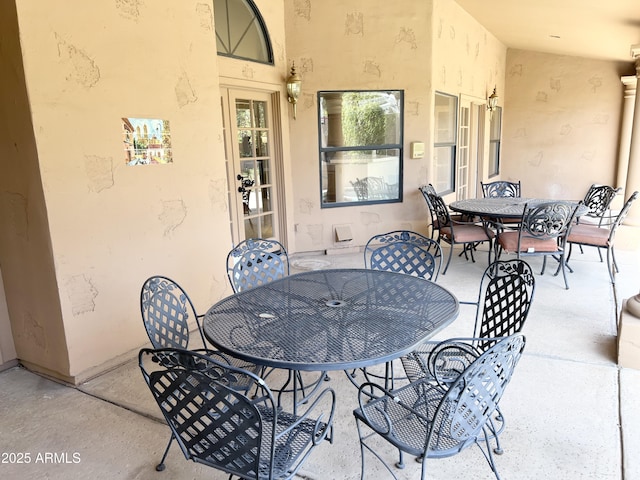 view of patio with outdoor dining area