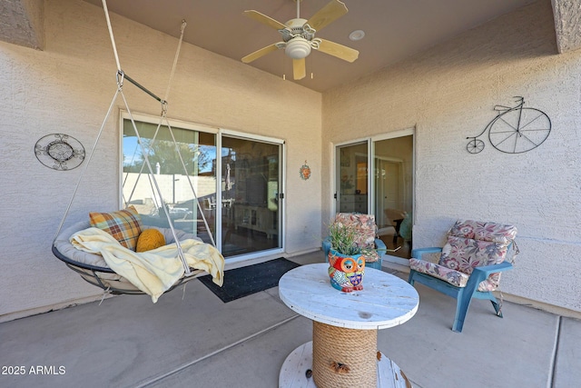 view of patio with ceiling fan