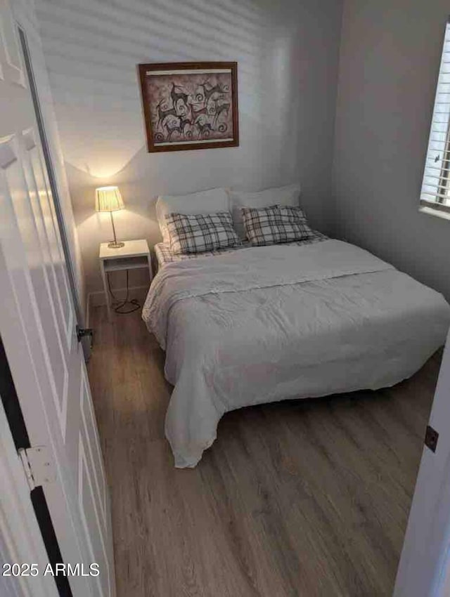 920 E Devonshire Ave Unit 2031, Phoenix, AZ 85014 - bedroom featuring wood finished floors