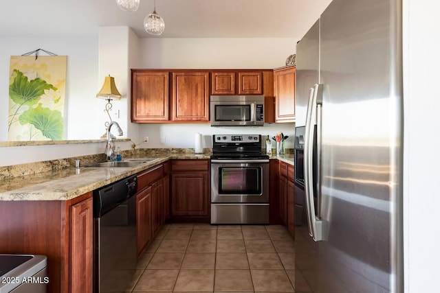 920 E Devonshire Ave Unit 2031, Phoenix, AZ 85014 - kitchen featuring stainless steel appliances, light tile patterned floors, light stone counters, brown cabinets, and hanging light fixtures