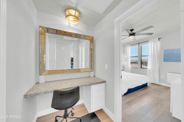 20100 N 78th Pl Unit 3103, Scottsdale, AZ 85255 - bathroom with wood finished floors, baseboards, ceiling fan, and ensuite bath