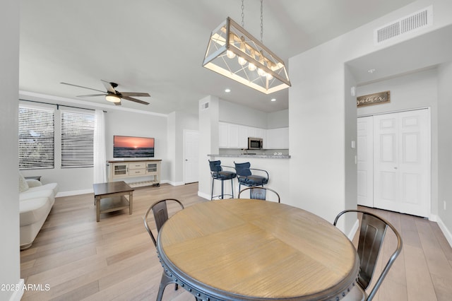 20100 N 78th Pl Unit 3103, Scottsdale, AZ 85255 - dining room with light wood finished floors, recessed lighting, baseboards, and a ceiling fan