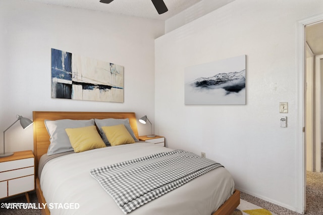 bedroom with baseboards, ceiling fan, carpet, and vaulted ceiling