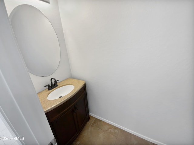 bathroom with tile patterned flooring and vanity