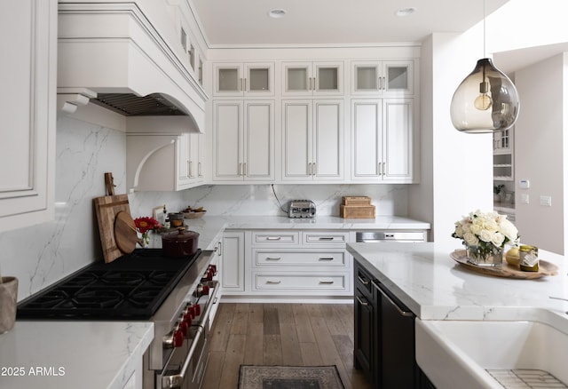 kitchen featuring range with two ovens, premium range hood, white cabinetry, dark wood-style flooring, and recessed lighting