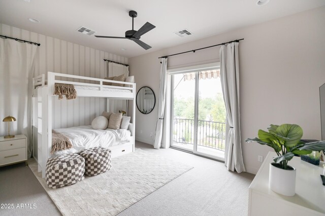 carpeted bedroom with access to outside and a ceiling fan