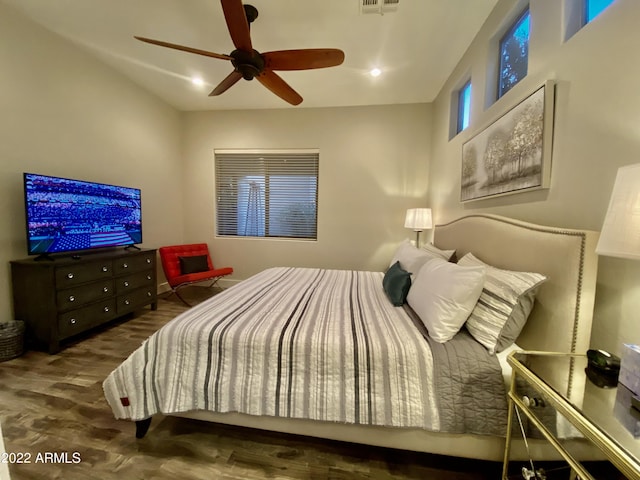 2042 W Periwinkle Way, Chandler, AZ 85248 - bedroom with wood finished floors and a ceiling fan