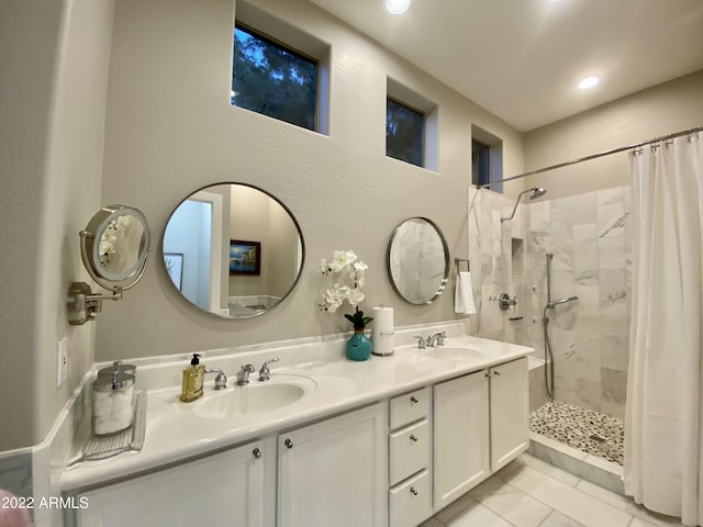 2042 W Periwinkle Way, Chandler, AZ 85248 - full bath with tiled shower, tile patterned floors, double vanity, and recessed lighting