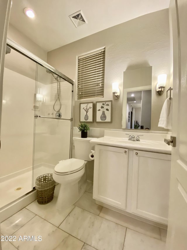 2042 W Periwinkle Way, Chandler, AZ 85248 - full bathroom with a stall shower, vanity, and toilet
