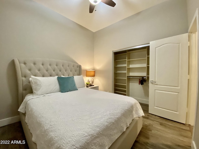 2042 W Periwinkle Way, Chandler, AZ 85248 - bedroom with wood finished floors, a closet, baseboards, ceiling fan, and lofted ceiling