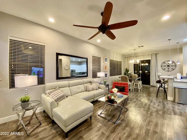 2042 W Periwinkle Way, Chandler, AZ 85248 - living area featuring a ceiling fan, wood finished floors, recessed lighting, baseboards, and a chandelier